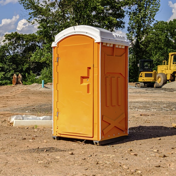 how often are the portable restrooms cleaned and serviced during a rental period in New Athens